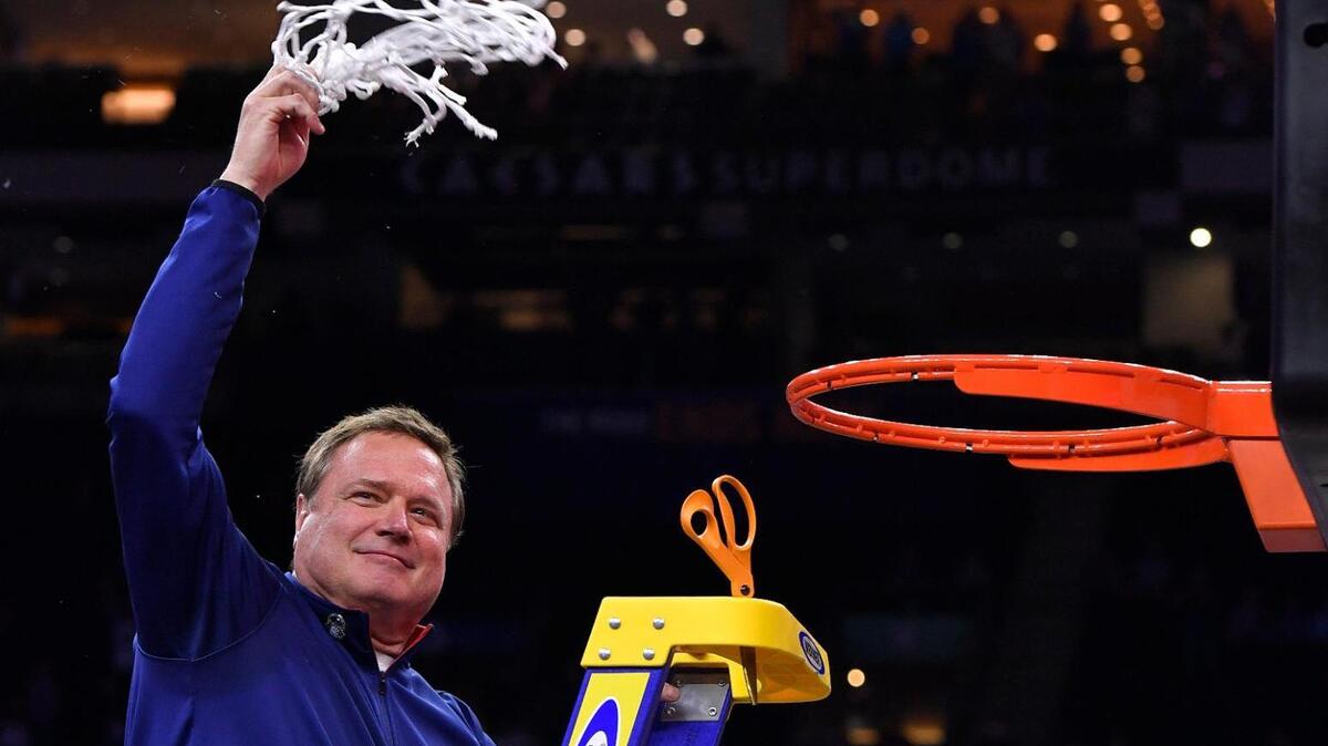 Kansas coach Bill Self got to make the final cut and wave the net for the Jayhawk faithfull after the Jayhawks beat North Carolina, 72-69 to claim the NCAA championship Monday night in New Orleans.