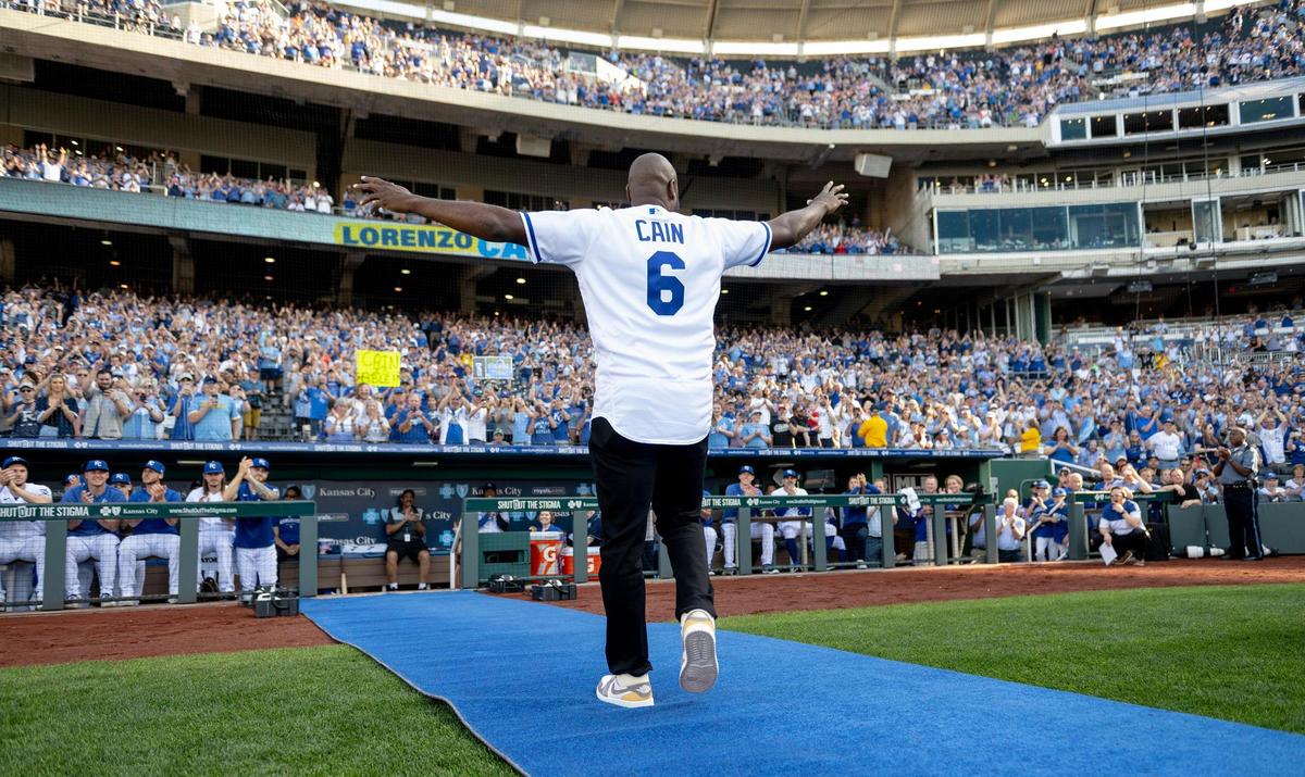Former Kansas City Royals center fielder Lorenzo Cain waves to fans during a retirement ceremony at Kauffman Stadium on Saturday, May 6, 2023, in Kansas City. Cain signed a ceremonial one-day contract to retire as a Royal.
