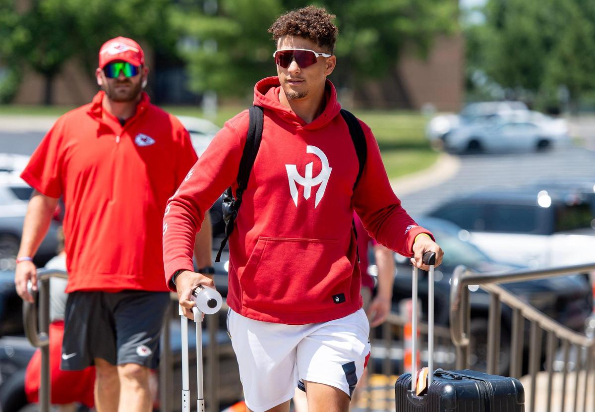 Kansas City Chiefs quarterback Patrick Mahomes wheels his belongings into a dorm room at Missouri Western State University during the first day of training camp on Tuesday, July 18, 2023, in St. Joseph, Mo.