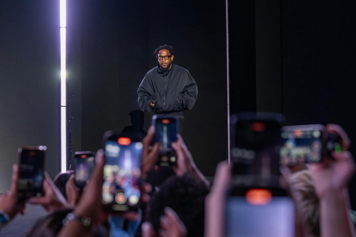 Rapper Kendrick Lamar walks out on stage during a press conference on Thursday, Feb. 6, 2025, in New Orleans. Lamar will headline the Super Bowl LIX halftime show.