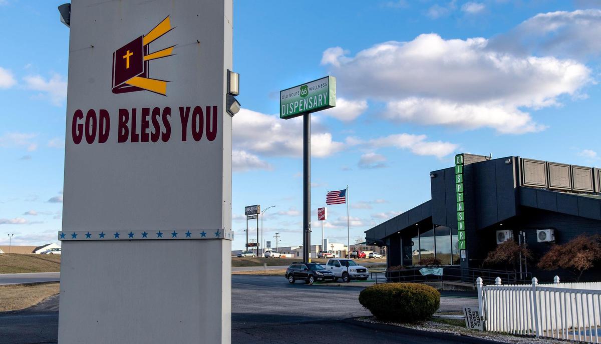 A sign reading “God bless you” is seen near the Old Route 66 Dispensary on Friday, Dec. 16, 2022, in Springfield, Mo.