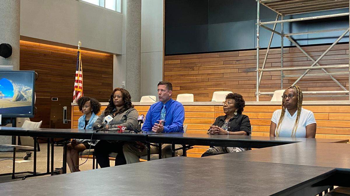 Aaron Eichelberger was fatally shot on May 14. Members of his family and Kansas City detective Scott Emery ask the public for help solving the case at a June 9, 2022, news conference at police headquarters.