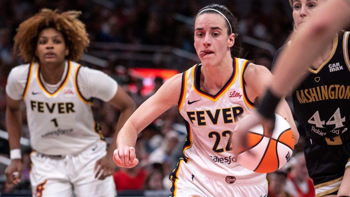 Indiana Fever guard Caitlin Clark (22) rushes up the court Wednesday, June 19, 2024, during a game at Gainbridge Fieldhouse in Indianapolis.