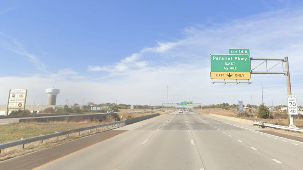 An Overland Park woman is in custody after she allegedly struck a driver on the head, while he was driving, causing him to lose consciousness and crash a vehicle near I-435 and Parallel Parkway in Kansas City, Kansas. This Google Maps Street View image of the area is from October 2024.
