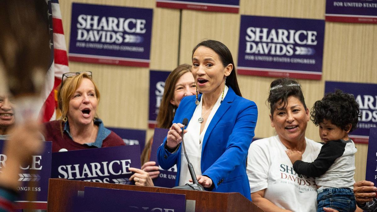 Kansas 3rd District Rep. Sharice Davids speak to a crowd of supporters in November 2022.