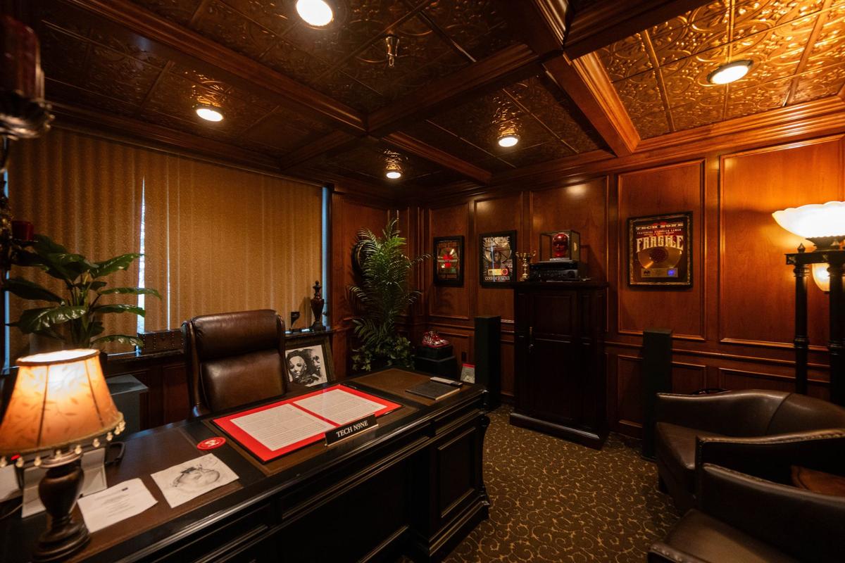 Tech N9ne’s office at the compound features copper ceilings, gold and platinum plaques, and various pieces of art.