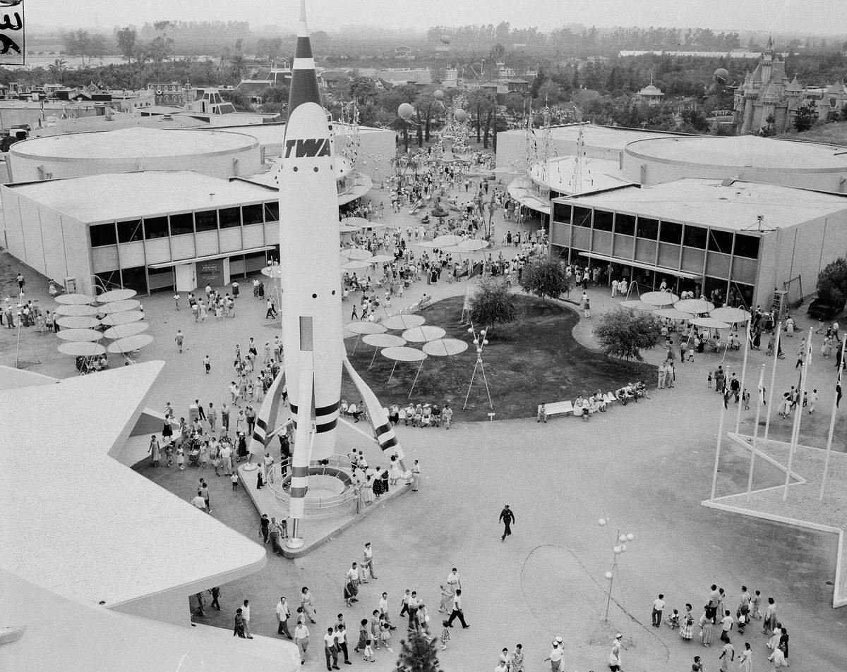 The TWA Moonliner rocketship dominates the Tomorrowland attraction at the Disneyland Amusement Park, which opened on July 17, 1955. 