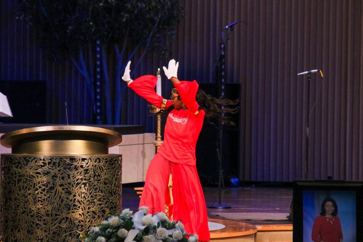 Kennison Keys, an Awesome Ambitions alumna, performs a praise dance at Cynthia Newsome’s funeral on May 30, 2026.