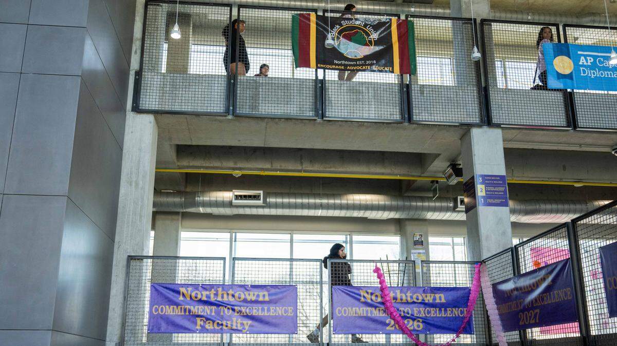 Students pass from the old building into the new, at North Kansas City High School on Wednesday, March 25, 2026, in North Kansas City. “Northtown” is celebrating 100 years of service to the community this year.
