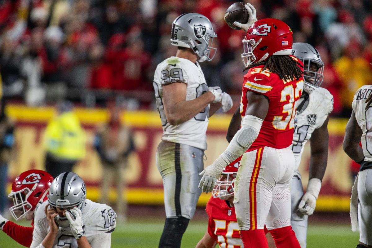 Kansas City Chiefs linebacker Nick Bolton recovers a botched snap Las Vegas Raiders quarterback Aidan O’Connell from the Raiders in the last minute of the Chiefs game vs. the Las Vegas Raiders on Friday, Nov. 29, 2024, at GEHA Field at Arrowhead Stadium.
