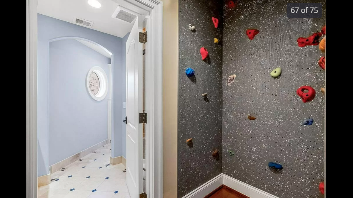 This smaller rock climbing wall inside 27596 W. Highland Circle in Olathe is kid-friendly, where they can climb from one floor to the next.