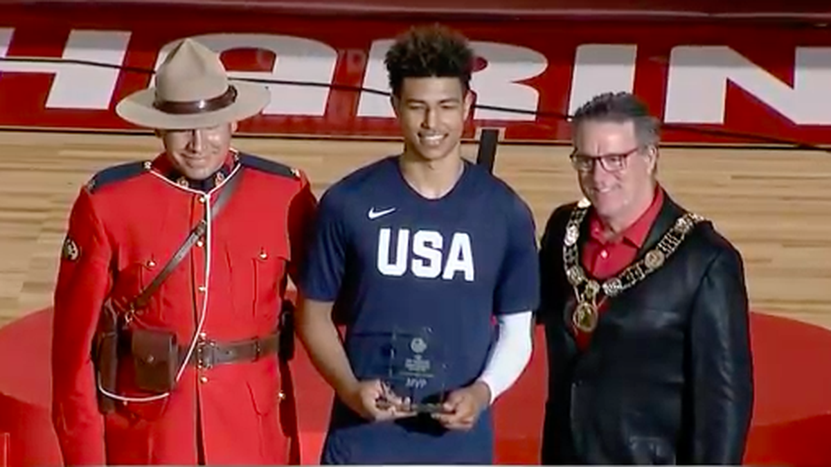 Kansas freshman Quentin Grimes poses with the MVP award from the FIBA Americans U18 Championships following his team's game on Saturday, June 15, 2018 in St. Catharines, Canada.