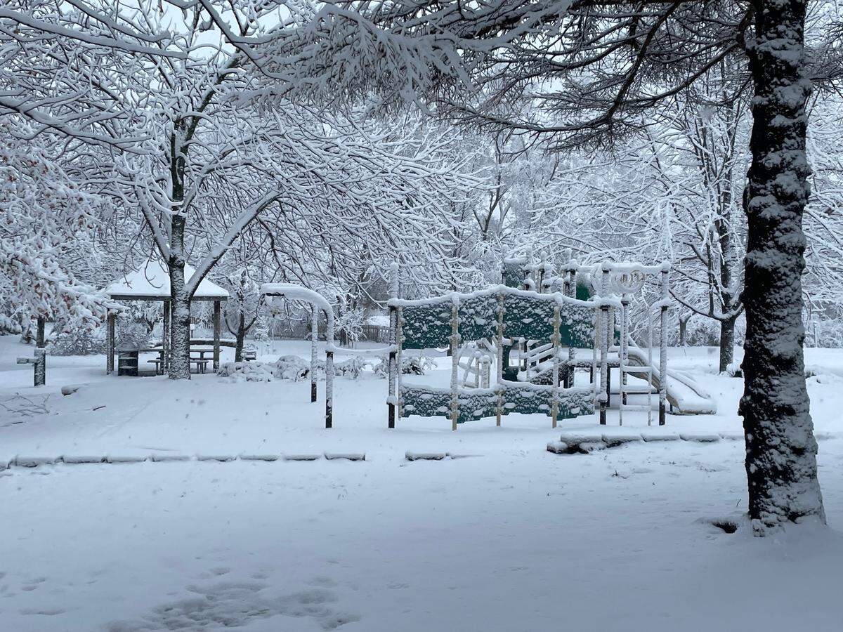 Snow blankets Woodbrook Park in Olathe, located at 14821 W. 123rd Terrace, on Tuesday morning, Jan. 9, 2023.