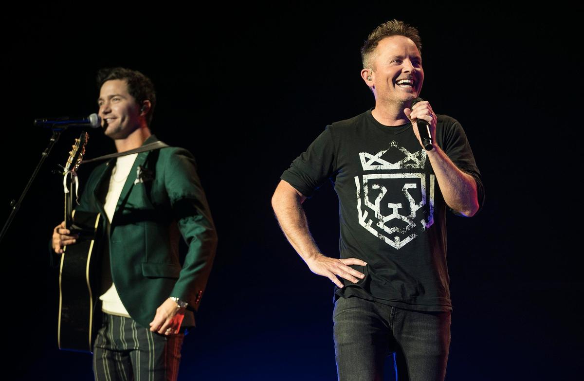 Christian artist Chris Tomlin (right) introduced guest artist Pat Barrett during the Sprint Center show.