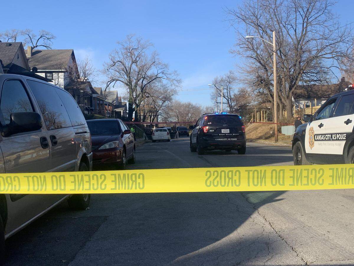 Police investigate a homicide in the 900 block of Ohio Avenue in Kansas City, Kansas.