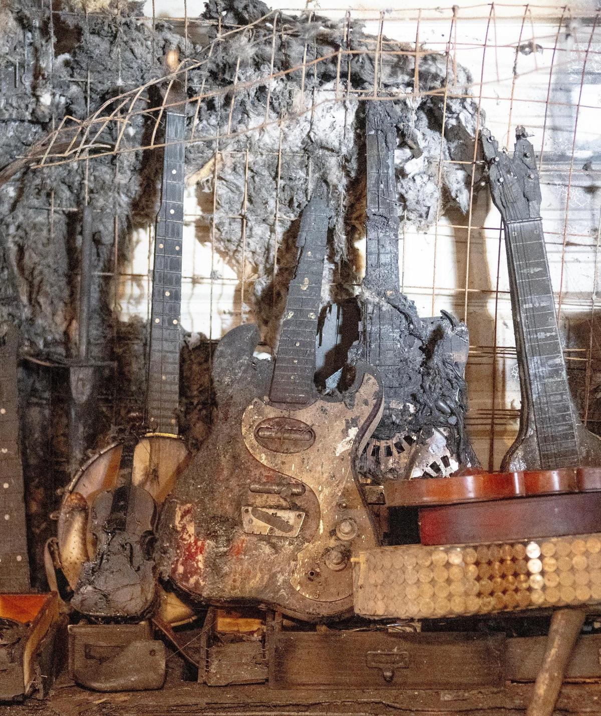 The charred remains of several musical instruments, burned in the August fire at BKB Leather.