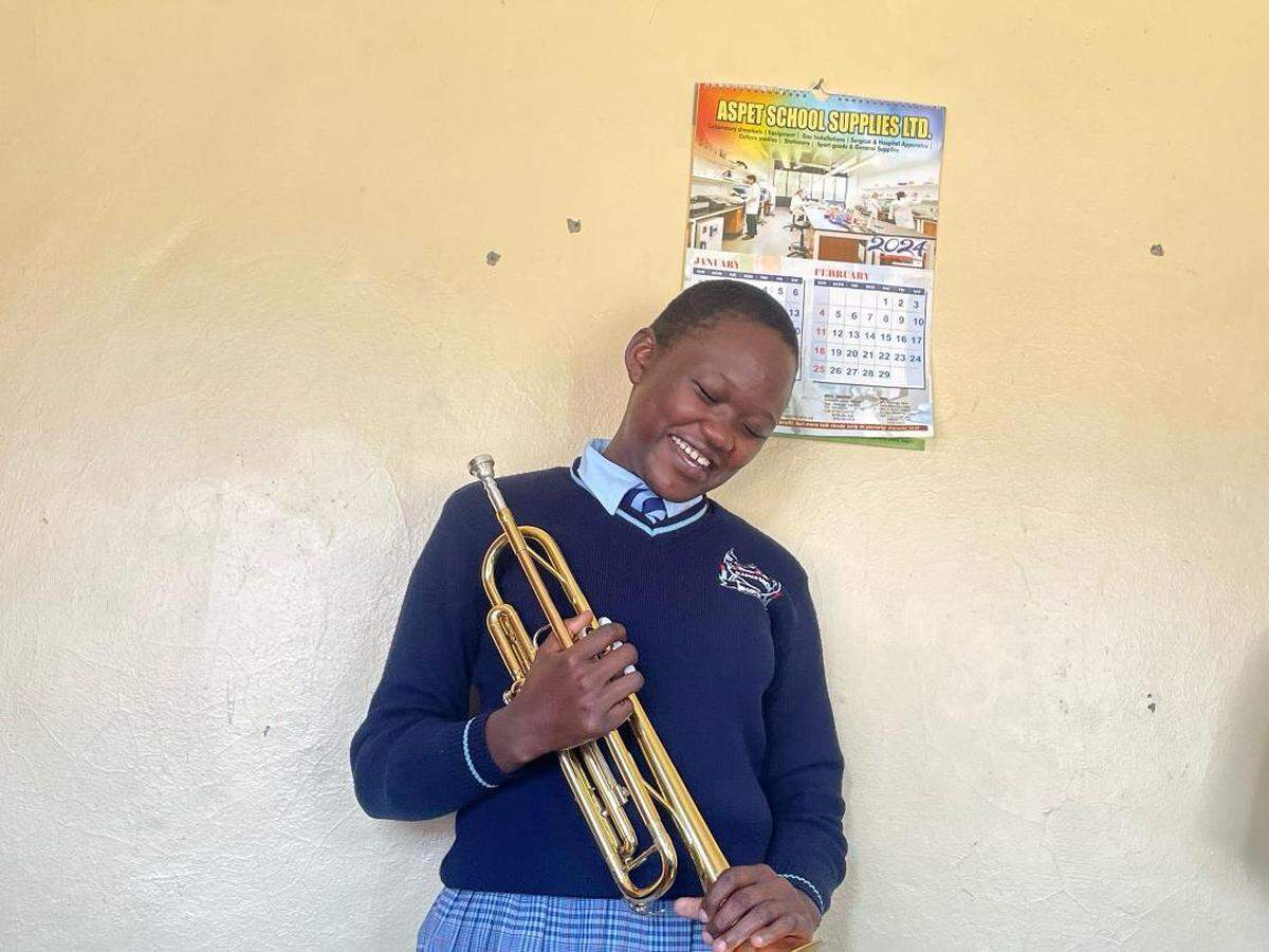 A Kenyan girl named Vern was thrilled to be given a trumpet. “She laughed with joy, she was so excited,” said Jamea Sale.