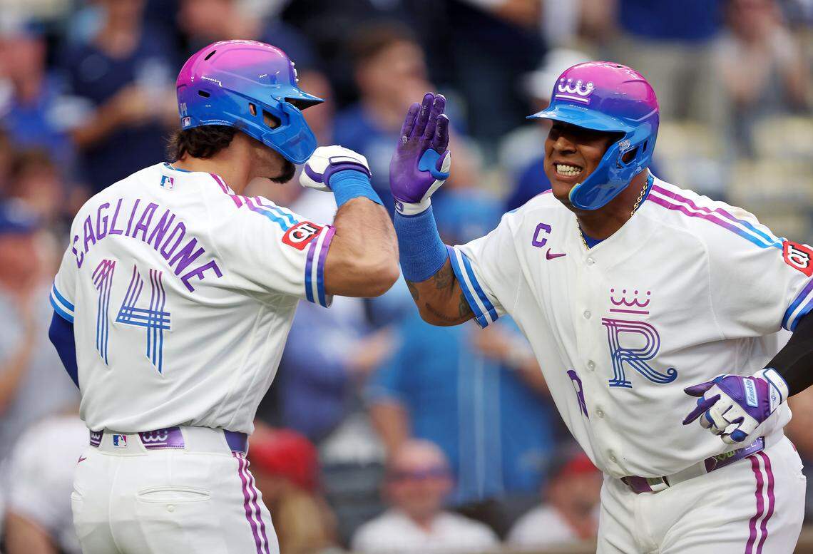 Salvador Perez #13 of the Kansas City Royals is congratulated by Jac Caglianone #14 after hitting a home run during the 2nd inning of the game against the Los Angeles Angels at Kauffman Stadium on April 25, 2026 in Kansas City, Missouri.