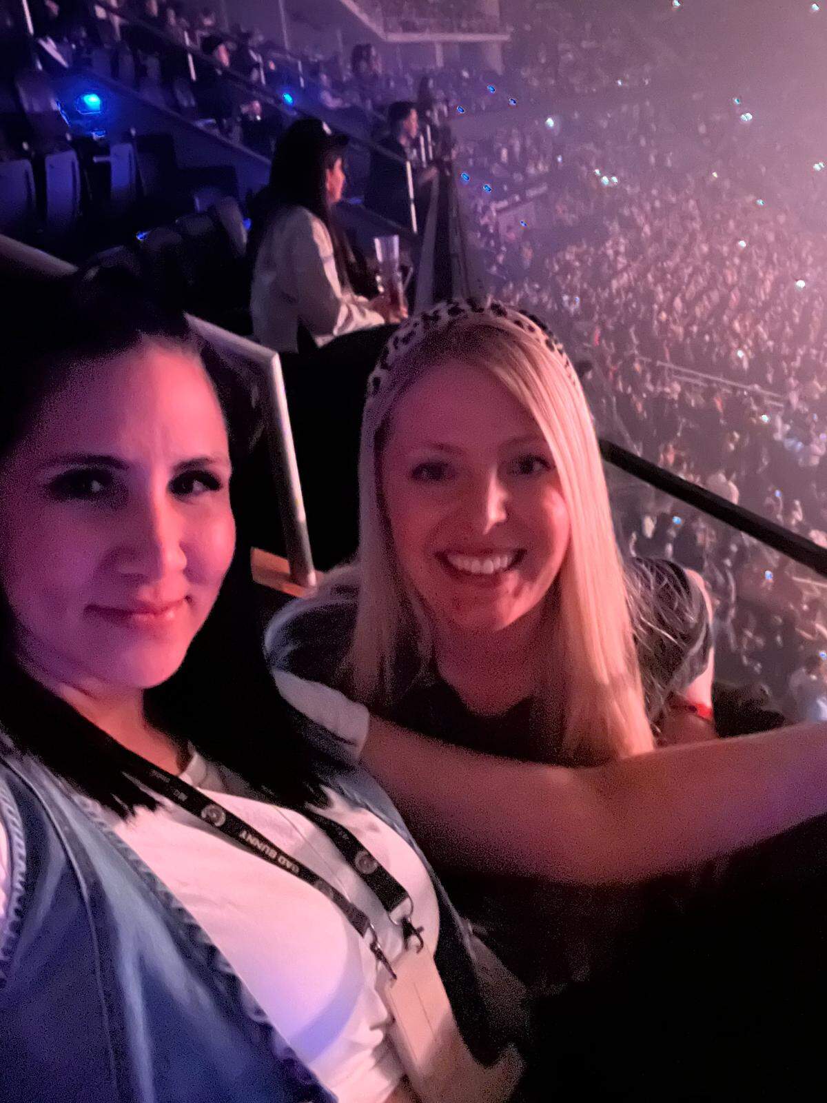 Katie Ramos, right, with friend Raquel Flores, at Bad Bunny concert at T-Mobile Center in 2024.