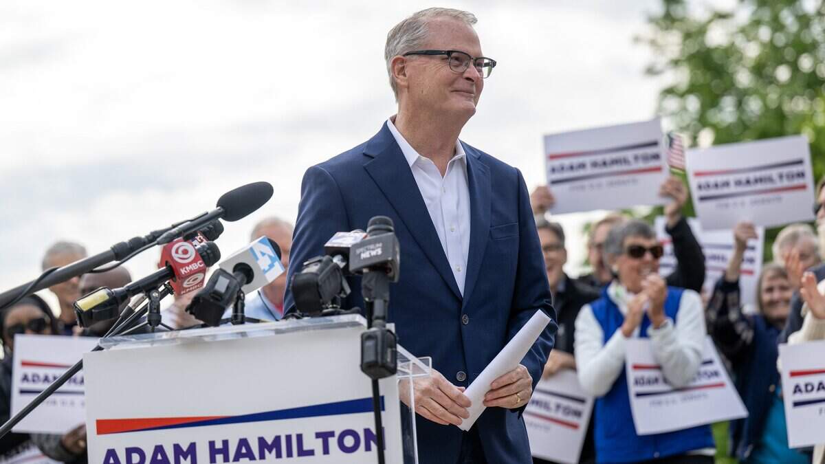 Supporters cheer after Rev. Adam Hamilton, senior pastor of the United Methodist Church of the Resurrection, delivers remarks announcing his run for U.S. Senate at Harmon Park on Thursday, April 30, 2026, in Prairie Village.