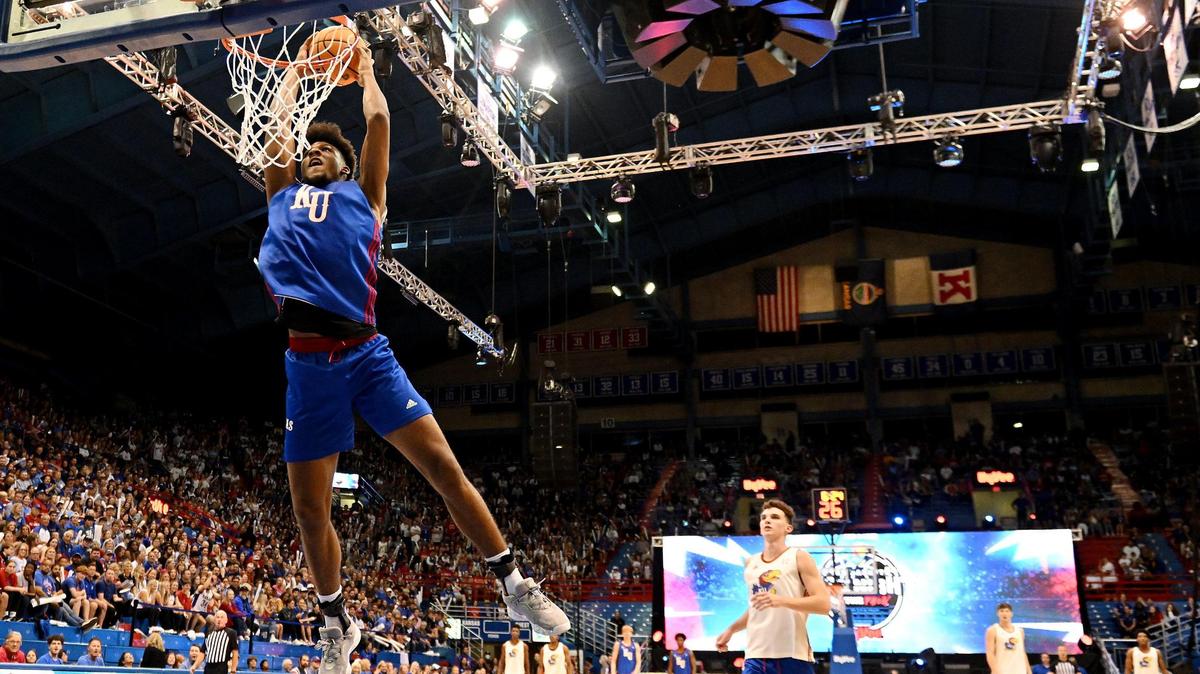 KU frehsman Zuby Eliofor throws down a dunk during Late Night in the Phog on Friday night at Allen Fieldhouse.
