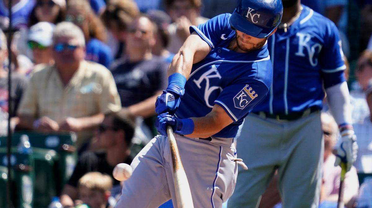 Kansas City Royals’ Andrew Benintendi hits a two-run double in the third inning of a baseball game against the Chicago Cubs, Sunday, Aug. 22, 2021, in Chicago. (AP Photo/Nam Y. Huh)