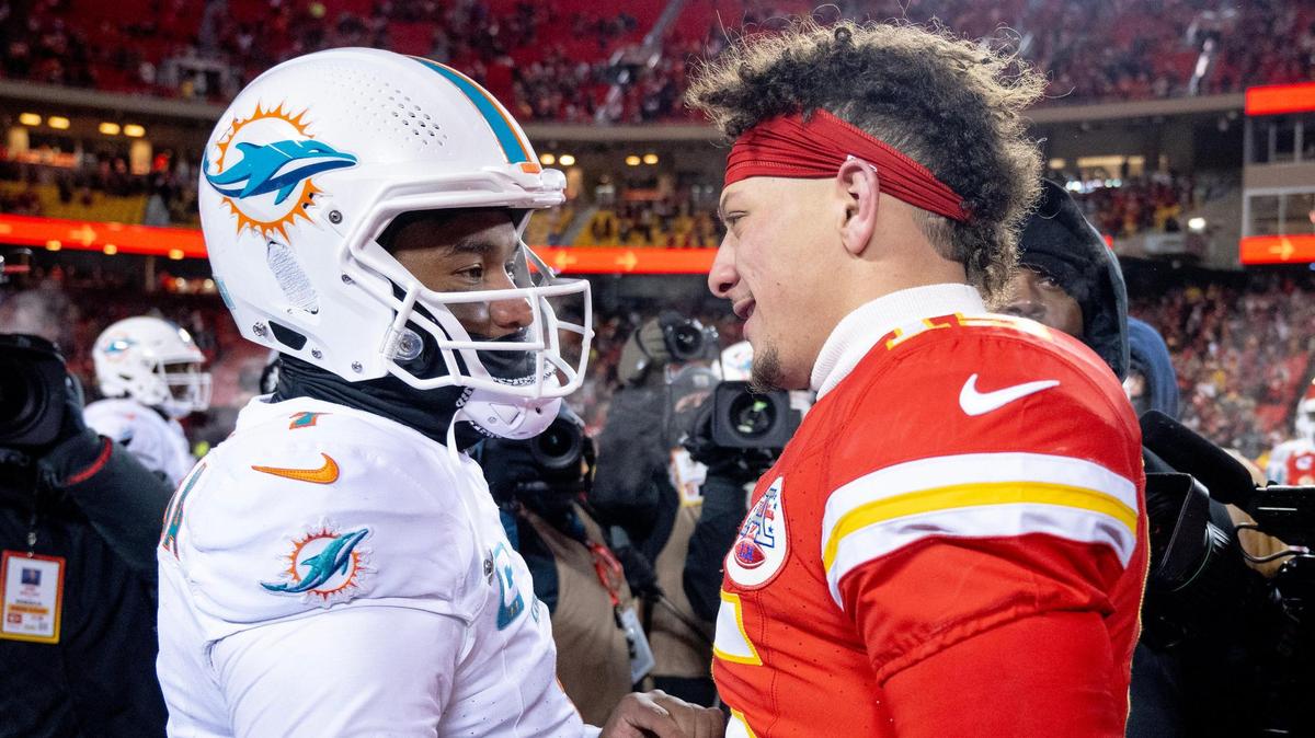 Kansas City Chiefs quarterback Patrick Mahomes (15) meets with Miami Dolphins quarterback Tua Tagovailoa (1) after the Chiefs defeated the Dolphins 26-7 in an AFC Wild Card game at GEHA Field at Arrowhead Stadium on Saturday, Jan. 13, 2024, in Kansas City.