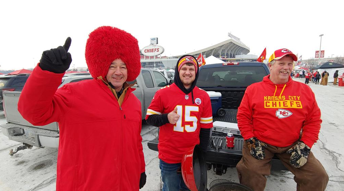 Brian Lisenbee of Maywood, Mo., (left) bought a new hat to wear to Sunday’s AFC Championship Game, where the Kansas City Chiefs would take on the New England Patriots. He tailgated in the parking lot with the Cody Martin and Dylan Martin of Taylor, Mo.