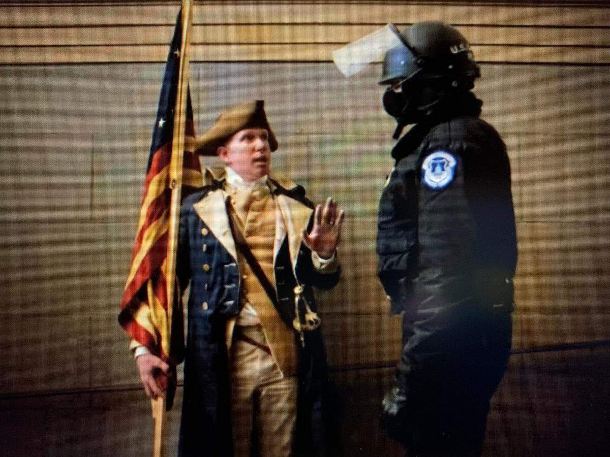 Isaac Yoder, owner of Yoder Lock and Key in Nevada, Missouri, was seen on camera in the Capitol Jan. 6 dressed as George Washington.