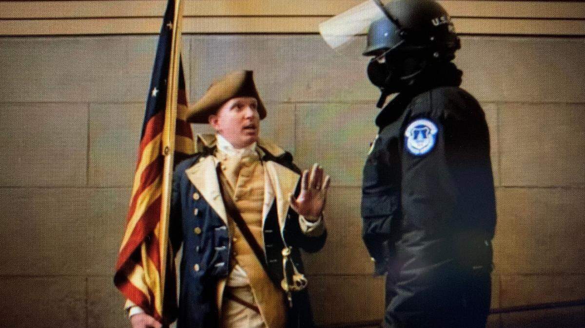 Isaac Yoder, owner of Yoder Lock and Key in Nevada, Missouri, was seen on camera in the Capitol Jan. 6 dressed as George Washington.