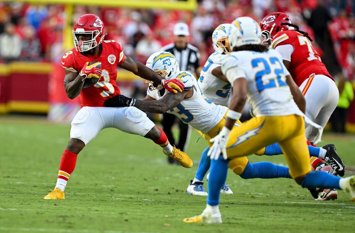 Kansas City Chiefs running back Kenneth Walker III (9) tries to avoid a tackle in the Kansas City Chiefs vs. Los Angeles Chargers NFL regular season game at Arrowhead Stadium in Kansas City on Oct. 18, 2026.