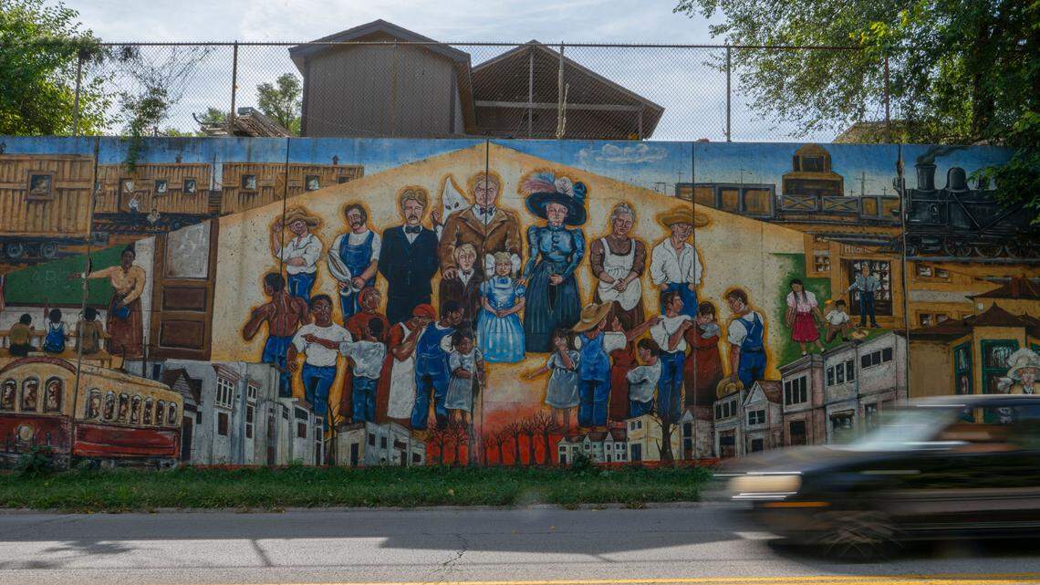 A mural of celebrating history the Argentine neighborhood is painted on a concrete retaining wall along Metropolitan Avenue on Tuesday, Oct. 4, 2022, in Kansas City.