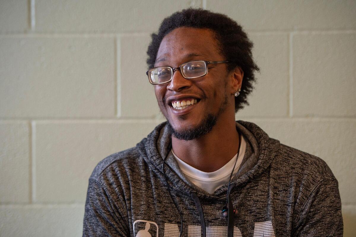 John Tyre Davis, a former resident, speaks about his experience at the L. Minor Care Center on Tuesday, April 25, 2023, in Kansas City.
