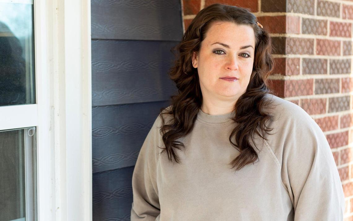 Kelly Powell received a KC Water bill that totaled more than $12,000 due to a faulty meter. She posed for a portrait at her home on Friday, Feb. 3, 2023, in Kansas City.