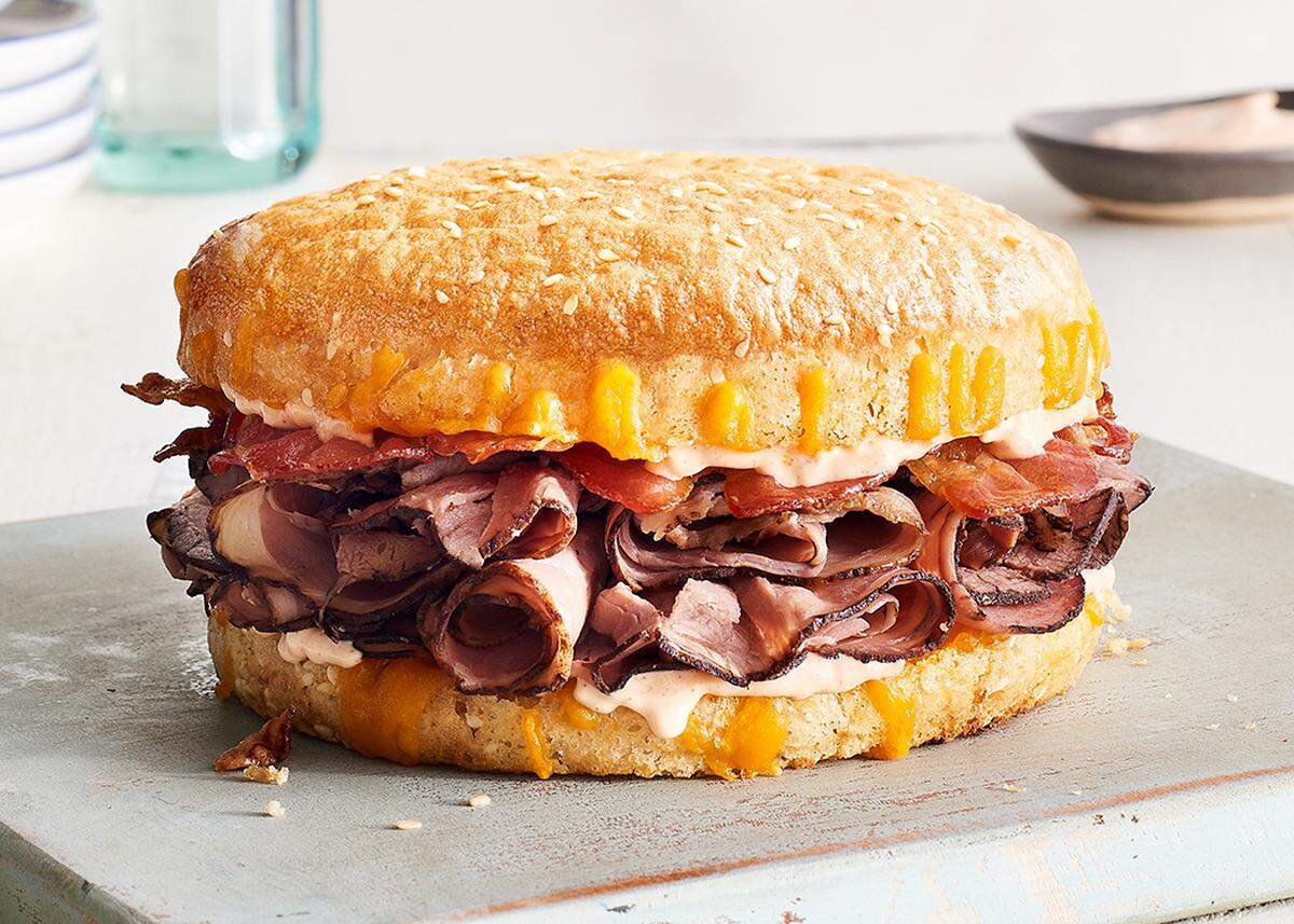 Schlotzsky’s Beef Bacon SmokeCheesy has shaved Angus roast beef with smoked cheddar cheese, bacon and chipotle mayonnaise. Served on its toasted house-made sourdough bun.