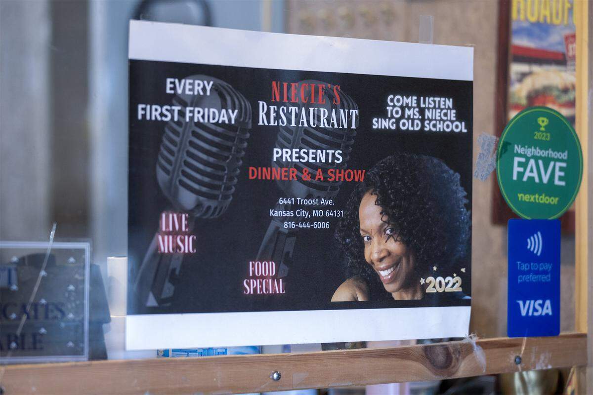 A poster is displayed in Niecie's restaurant promoting “Dinner & A Show” on Friday, Feb. 6, 2026, where Ward performs on the First Friday of every month at her soul food institution.