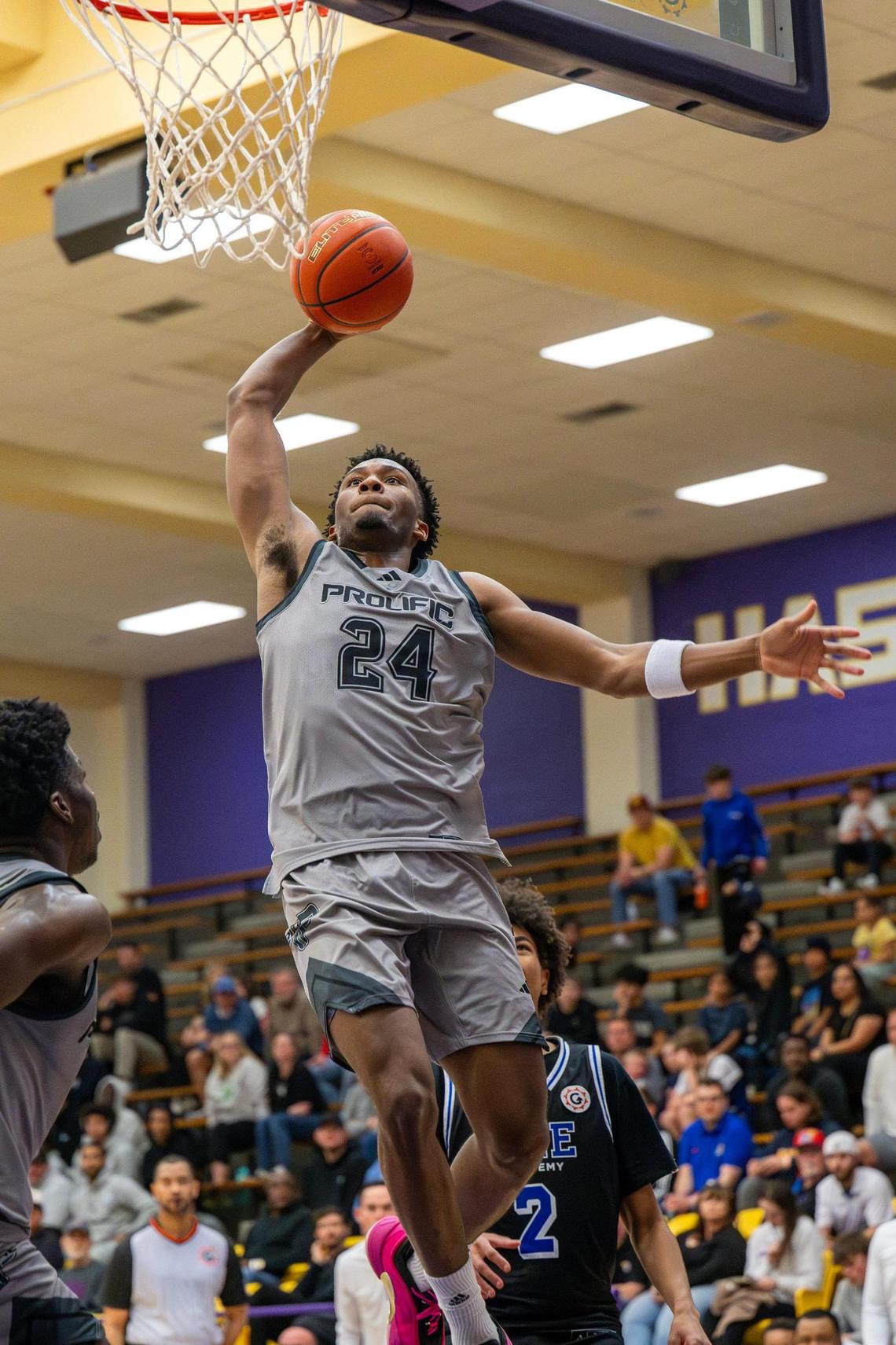 Prolific Prep guard Darryn Peterson (24) dunks the ball in the second half against DME Academy during the Grind Session High School Basketball World Championships at Coffin Sports Complex on Saturday, March 22, 2025, in Lawrence, Kansas.