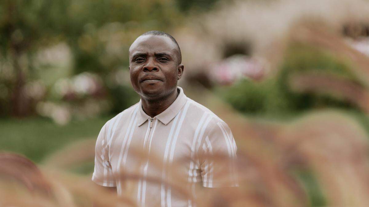 Solomon Kasongo on the campus at Rockhurst University Oct. 10. Driven from the Democratic Republic of Congo by war, he wants start a nonprofit to help other refugees. (Chase Castor/The Beacon)