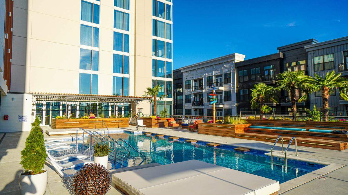 This image shows the pool area at Margaritaville Resort in downtown Nashville, which opened in 2019. Developers of the Homefield youth sports project near Village West plan to bring the Jimmy Buffett-inspired hotel and resort to Kansas City, Kansas.