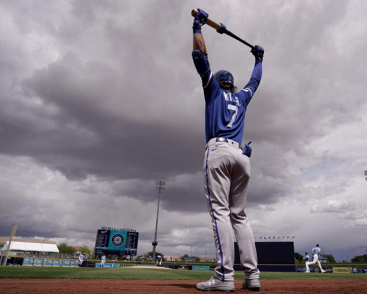 Kansas City Royals infielder Bobby Witt Jr. warms up in the on-deck circle during a recent spring training game against the Seattle Mariners in Peoria, Ariz.