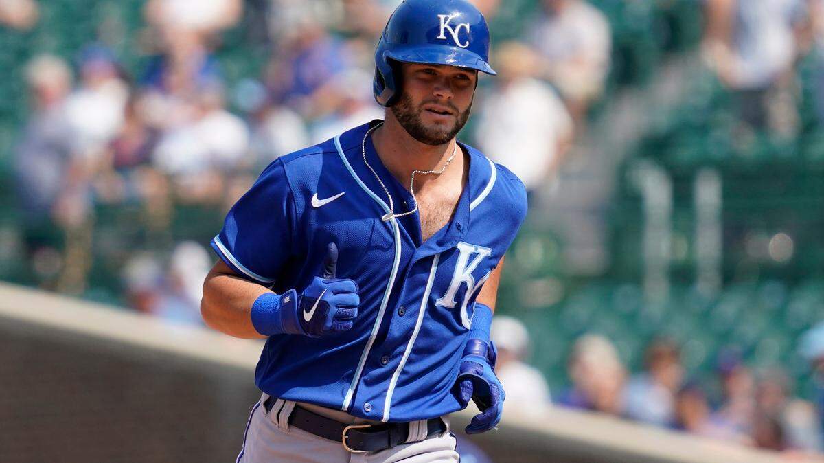 Kansas City Royals’ Andrew Benintendi rounds the bases after hitting a solo home run in the sixth inning of a baseball game against the Chicago Cubs, Friday, Aug. 20, 2021, in Chicago. (AP Photo/Nam Y. Huh)