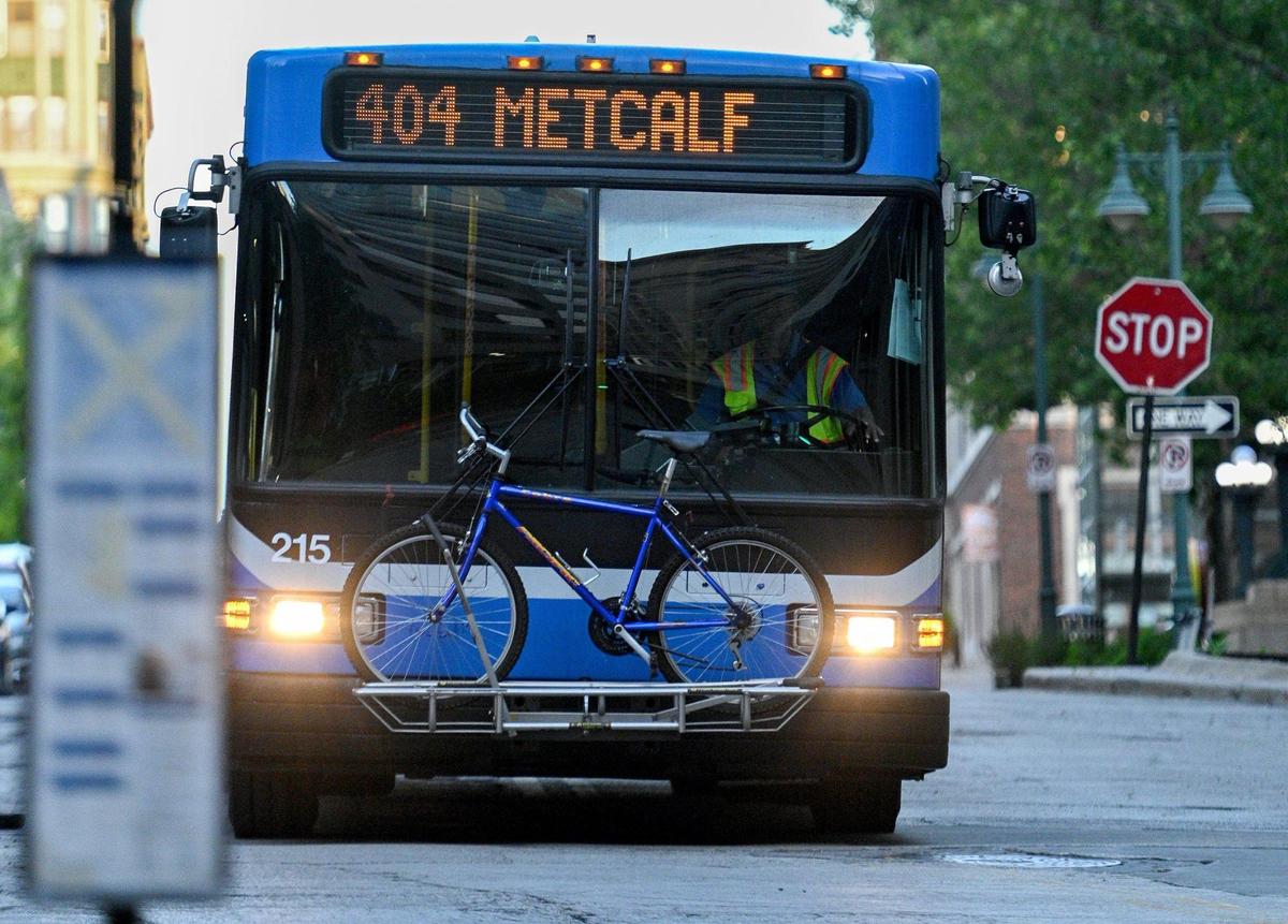 The No. 404 bus arrives at the bus stop at 10th and Main streets in Kansas City early on a Friday morning in June. The bus takes about an hour to reach Olathe.
