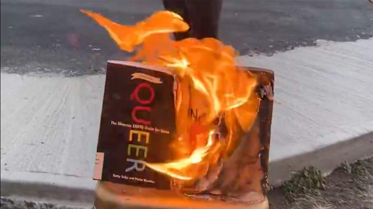 Missouri secretary of state candidate Valentina Gomez posted video to social media showing her using a flamethrower to burn books with LGBT themes, including "Queer: The Ultimate LGBTQ Guide for Teens” by writers Kathy Belge and Marke Bieschke 