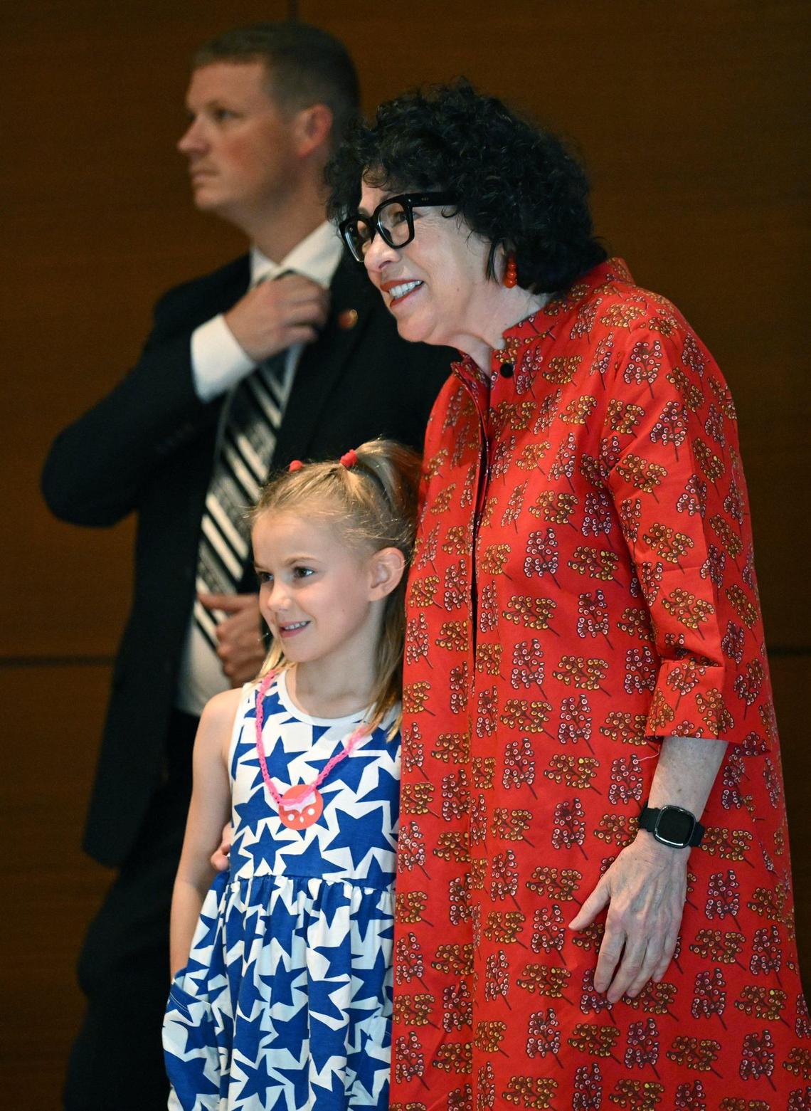 Justice Sotomayor has her photo taken with Beverly Gearheart, 6, after she read her book “Just Ask! Be Different, Be Brave, Be You” to a group of children during a stop at The Kansas City Public Library.