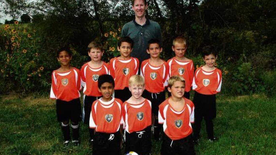 Nicholas Gioacchini (back row, far left) played for Blue Valley Soccer Club when he was young, and his specific team was the Orange Stars, coached by Jay Burgess.