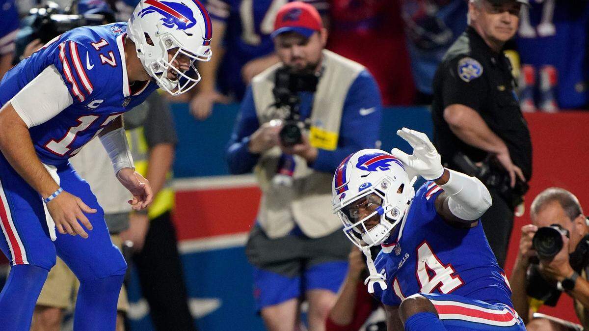 Buffalo Bills quarterback Josh Allen (17) and wide receiver Stefon Diggs (14) celebrate a touch down during the third quarter at Highmark Stadium Monday, Sept. 19, 2022, in Orchard Park, New York.