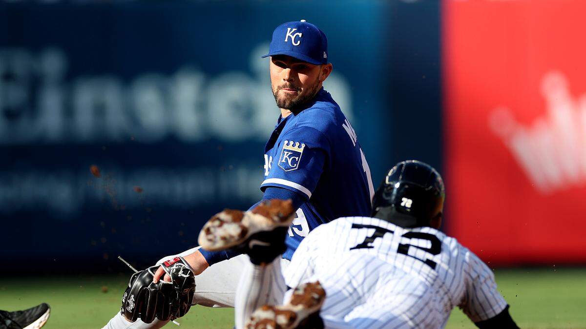 Yankees baserunner José Caballero tags up and slides safely into second base as Michael Massey of the Kansas City Royals applies a slightly late tag during a game at Yankee Stadium in New York on April 19, 2026.