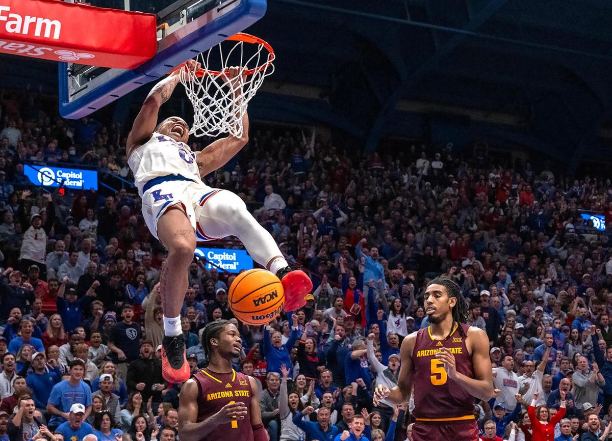 Kansas Jayhawks guard Shakeel Moore (No. 0) slams down a dunk during a college basketball game against the Arizona State Sun Devils at Allen Fieldhouse on Wednesday, Jan. 8, 2025, in Lawrence, Kansas.
