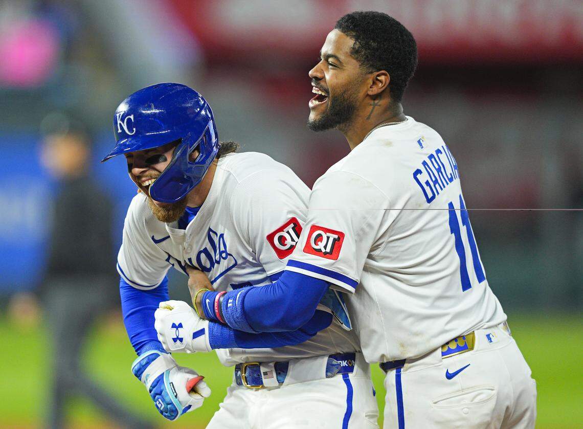 Royals shortstop Bobby Witt Jr., left, is congratulated by KC teammate Maikel Garcia after hitting a walkoff home run against the Chicago White Sox on May 6, 2025 at Kauffman Stadium in Kansas City.