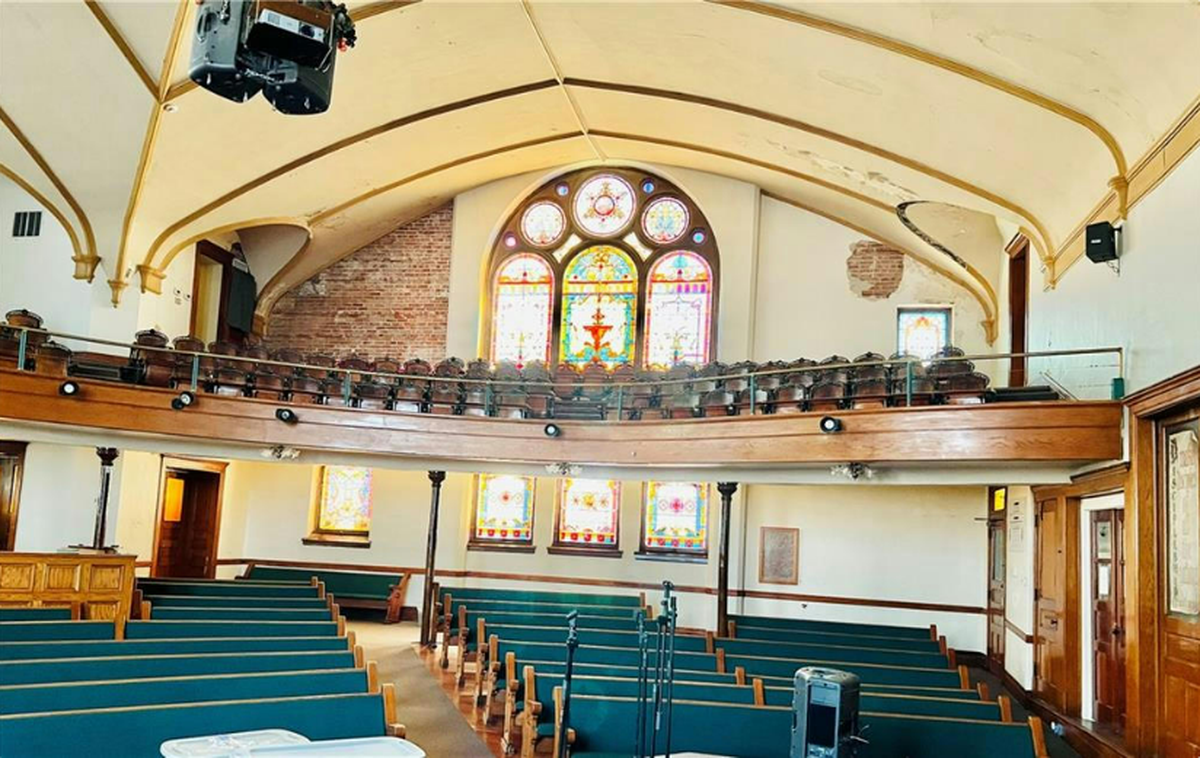 The inside of The Calvary Chapel, 1215 Jules St. in St Joseph. The church is on sale for $99,000 and is listed by real estate company Re/Max.